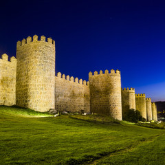 Fototapeta na wymiar Scenic medieval city walls of Avila at night, Spain, UNESCO list