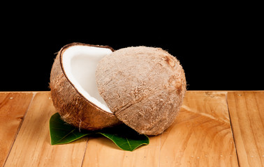 Fototapeta na wymiar coconut on wood