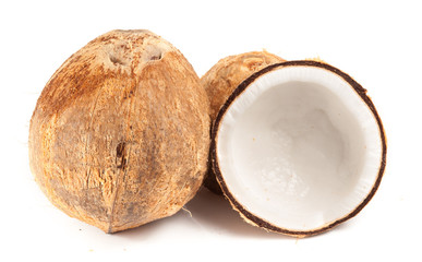 Coconut with straw isolated on white