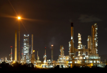Obraz na płótnie Canvas Architecture of Petrochemical oil refinery plant with sunrise t