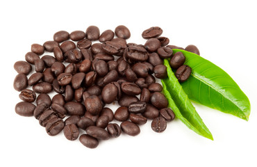 Closeup of coffee beans with focus on one