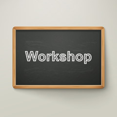 workshop on blackboard in wooden frame