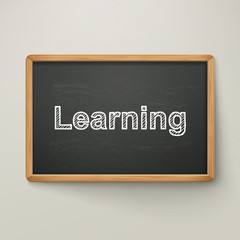 Fototapeta premium learning on blackboard in wooden frame