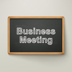 Fototapeta premium business meeting on blackboard in wooden frame