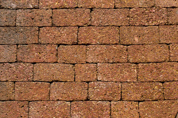 temple brick wall background and texture in Goa, India