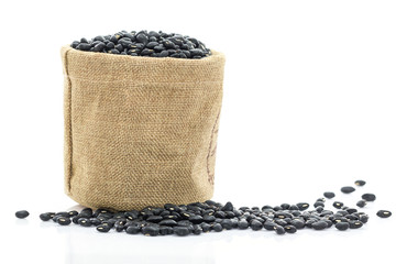 Fototapeta na wymiar Dried black beans in Sacks fodder