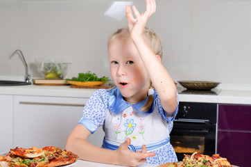 Young girl wiping her mouth