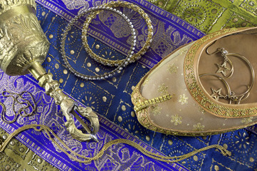Idian ethnic still life with belly dance shoe and jewelry