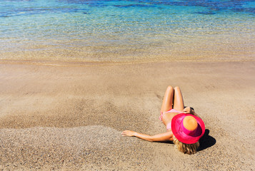 Woman relaxing on the beach