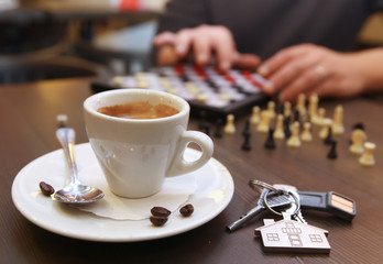 Cup of coffee and chess