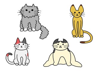 座っている猫たち