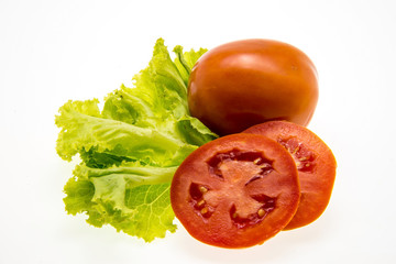 tomato and lettuce on white background