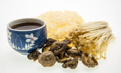 mushroom tea and assortment of mushrooms