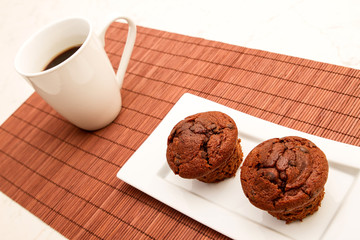 Chocolate Muffins with a cup of coffee