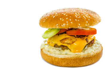 Cheeseburger with bacon and tartar sauce and garden salad