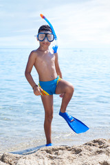 Summer vacation - Portrait of happy boy in face masks and snorke