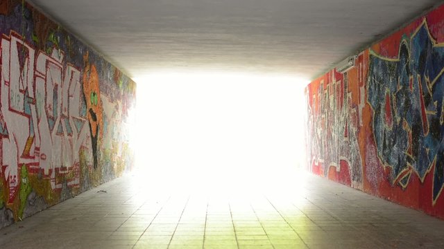 pedestrian underpass - light at end of tunnel