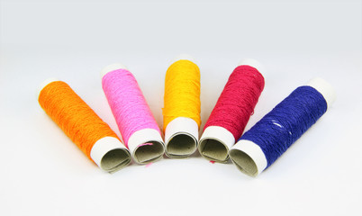 colored spools of threads