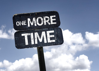 One More Time sign with clouds and sky background