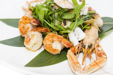 shrimp salad greens vegetables and crayfish in the restaurant