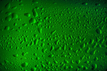 Texture water drops on the bottle of beer.