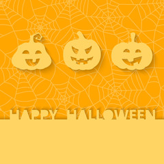 Fototapeta premium Three orange pumpkins on the background of the web. Halloween