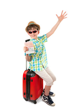 The young tourist with suitcase and passport with visa