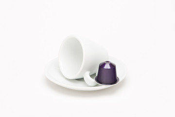 Cup of coffee with capsule