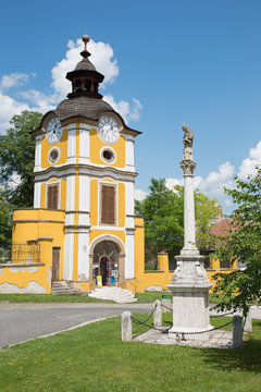 Spisska Kapitula - St. John the Nepomuk column anb clock tower.