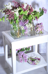 Beautiful lilac flowers in vase,