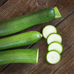 Zucchini on the wooden table