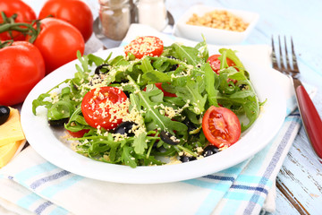 Fresh salad with arugula, close up