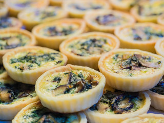 Mini spinach mushroom quiche pie.