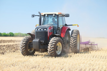 Obraz premium tractor with a plow
