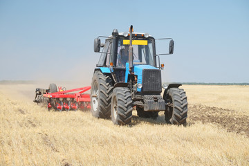 Obraz premium tractor with a plow