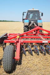 Fototapeta premium tractor with a plow