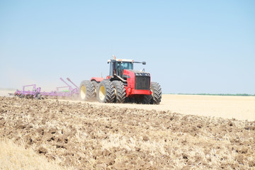 Obraz premium tractor with a plow