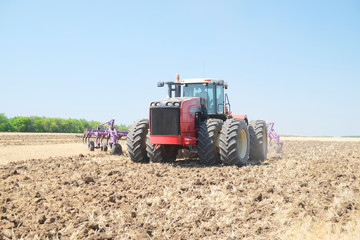 Obraz premium tractor with a plow