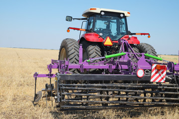 Obraz premium tractor with a plow