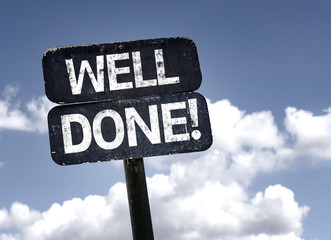 Well Done! sign with clouds and sky