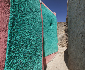 Narrow alleyway of ancient city of Jugol in the morning. Harar.