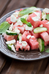 Salad with watermelon, cucumber and feta cheese, vertical shot