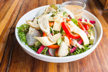 Chicken cheese salad with caesar dressing