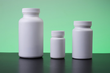 Three supplements bottles