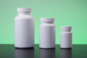 Three supplements bottles