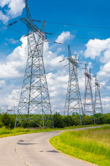 Pylon and transmission power line in summer day