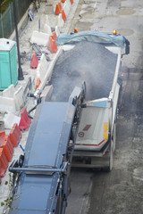 White lorry and conveyor belt