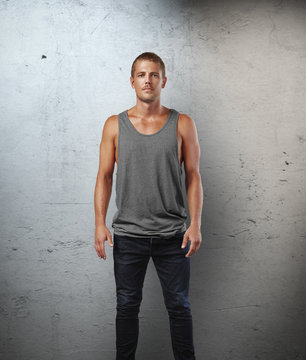 man wearing sleeveless shirt