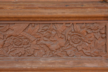 Old brawn carving wooden wall