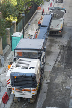 white lorry and conveyor belt